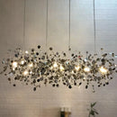Pendente Dente de Leão,
lustre moderno,
Lustre Dimerizável,
Lustre Folhas,
Lustre de Teto,
Lustre,
Luminária Pendente,
luminaria teto,
luminaria de teto,
arandela de teto