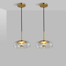 pendente italiano moderno, lustre pendente vidro fumê, pendente âmbar luxo, pendente transparente moderno, lustre design italiano, pendente meia lua vidro, pendente moderno sofisticado, iluminação gourmet moderna, pendente luxo contemporâneo, lustre pendente cozinha moderna, pendente minimalista vidro, pendente LEDZ mezza luna