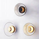 arandela italiana moderna, arandela vidro fumê, arandela âmbar luxo, arandela transparente moderna, arandela design italiano, arandela moderna sofisticada, arandela parede luxo, arandela minimalista contemporânea, iluminação indireta sofisticada, arandela moderna LEDZ, arandela quarto moderno, arandela cabeceira luxo, arandela decorativa premium