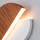 arandela de parede, arandela de parede interna, arandela minimalista, arandela moderna, arandela rotacionável, arandela 360 graus, arandela giratória, arandela circular, arandela meia lua, arandela LED, arandela LED integrada, arandela de parede LED, arandela preta, arandela efeito madeira, arandela amadeirada, arandela decorativa, arandela iluminação indireta, arandela para quarto, arandela para cabeceira, arandela para sala, arandela para corredor, arandela para hall de entrada, arandela para sala de esta