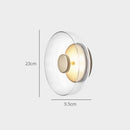 arandela italiana moderna, arandela vidro fumê, arandela âmbar luxo, arandela transparente moderna, arandela design italiano, arandela moderna sofisticada, arandela parede luxo, arandela minimalista contemporânea, iluminação indireta sofisticada, arandela moderna LEDZ, arandela quarto moderno, arandela cabeceira luxo, arandela decorativa premium