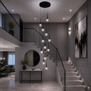 lustre para pé direito duplo, pendente para pé direito duplo, lustre pingo, pendente pingo, lustre de luxo, lustre moderno para escada, lustre para escadaria, lustre para hall de entrada, lustre para sala com pé direito duplo, pendente para escada, lustre cascata, pendente cascata, lustre dourado moderno, lustre preto moderno, lustre LED moderno, lustre alto padrão, lustre contemporâneo, lustre decorativo de luxo, iluminação para pé direito duplo, lustre para mezanino, lustre para recepção, lustre para resi
