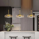 pendente italiano moderno, lustre pendente vidro fumê, pendente âmbar luxo, pendente transparente moderno, lustre design italiano, pendente meia lua vidro, pendente moderno sofisticado, iluminação gourmet moderna, pendente luxo contemporâneo, lustre pendente cozinha moderna, pendente minimalista vidro, pendente LEDZ mezza luna