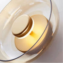 arandela italiana moderna, arandela vidro fumê, arandela âmbar luxo, arandela transparente moderna, arandela design italiano, arandela moderna sofisticada, arandela parede luxo, arandela minimalista contemporânea, iluminação indireta sofisticada, arandela moderna LEDZ, arandela quarto moderno, arandela cabeceira luxo, arandela decorativa premium