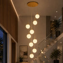 lustre para pé direito duplo, lustre globos, lustre de luxo, lustre clássico, lustre moderno, lustre para escada, lustre para hall de entrada, lustre para mezanino, lustre para sala com pé direito duplo, lustre de vidro, lustre com globos, lustre globo branco, lustre dourado, lustre prata, pendente para pé direito duplo, lustre escada moderna, lustre para residência de alto padrão, lustre para foyer, lustre para recepção, lustre para hotel, lustre para clínica, lustre para showroom, lustre com soquete E27, 