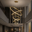 lustre para pé direito duplo, lustre moderno grande, lustre anéis LED, lustre espiral moderno, lustre contemporâneo luxo, lustre monumental moderno, lustre para escada, lustre para hall de entrada, lustre pé direito alto, lustre LED moderno, lustre minimalista luxo, lustre dourado moderno, lustre preto moderno, lustre sofisticado contemporâneo, lustre decorativo premium, lustre de luxo LED, lustre moderno para sala, lustre pendente monumental, lustre grande elegante, lustre escultural contemporâneo, lustre 