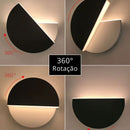 arandela de parede, arandela de parede interna, arandela minimalista, arandela moderna, arandela rotacionável, arandela 360 graus, arandela giratória, arandela circular, arandela meia lua, arandela LED, arandela LED integrada, arandela de parede LED, arandela preta, arandela efeito madeira, arandela amadeirada, arandela decorativa, arandela iluminação indireta, arandela para quarto, arandela para cabeceira, arandela para sala, arandela para corredor, arandela para hall de entrada, arandela para sala de esta